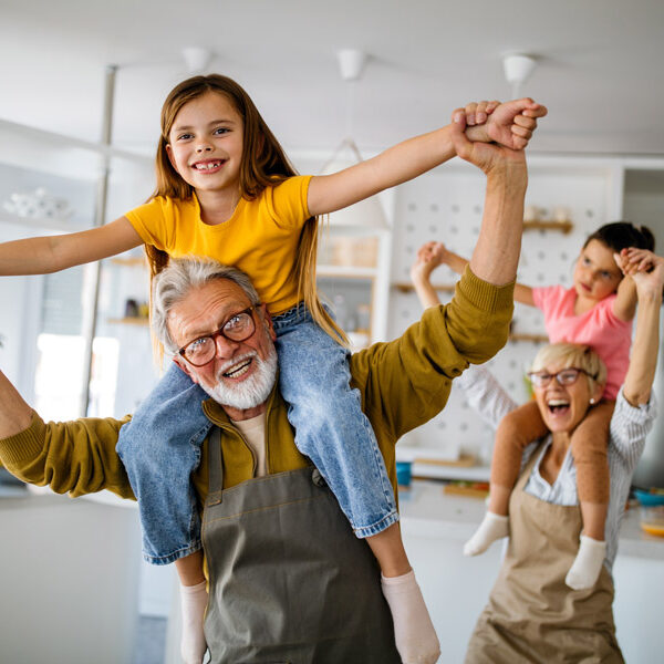 Grandkids on grandparents shoulders